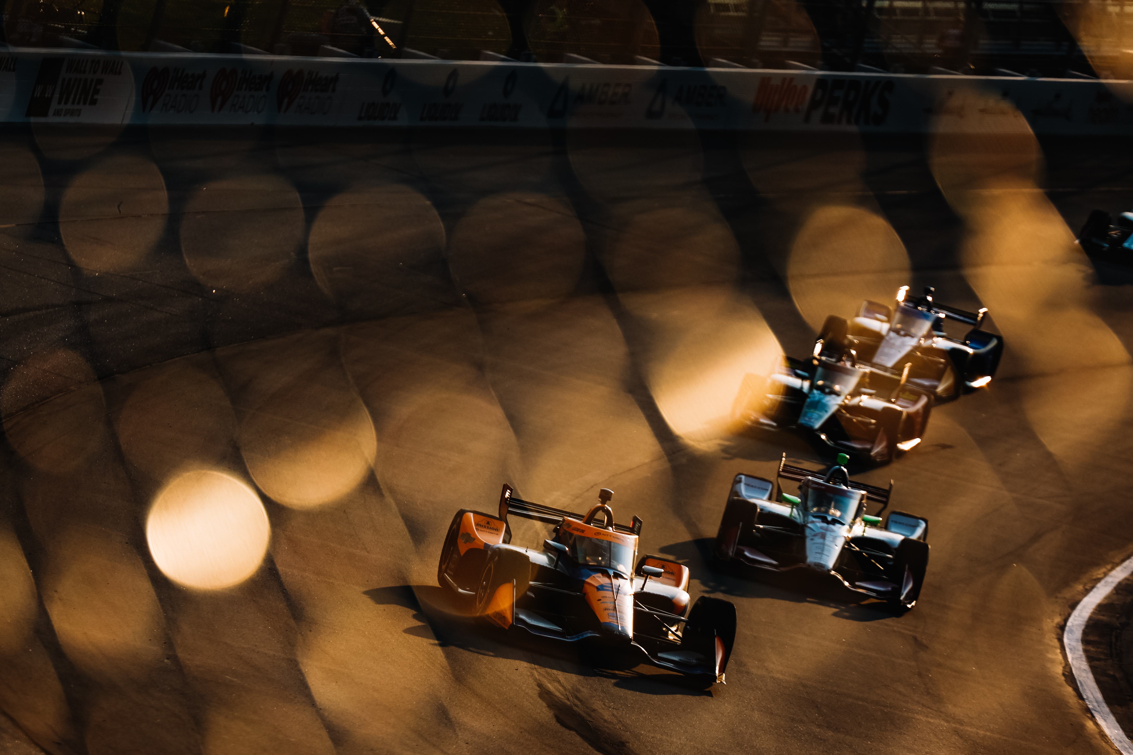 Cars driving around the Iowa Speedway in 2024