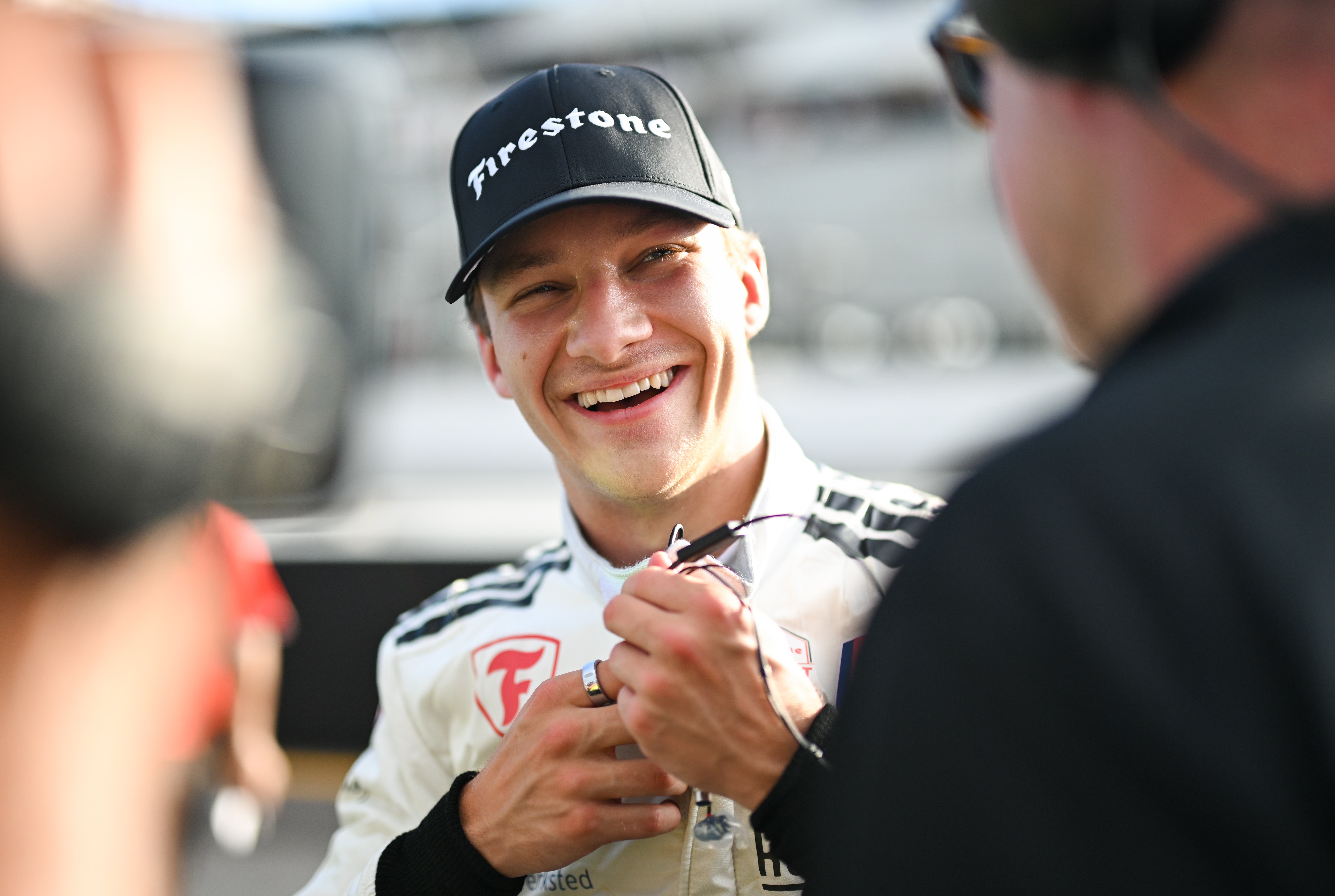 Dennis Hauger smiling and preparing to race