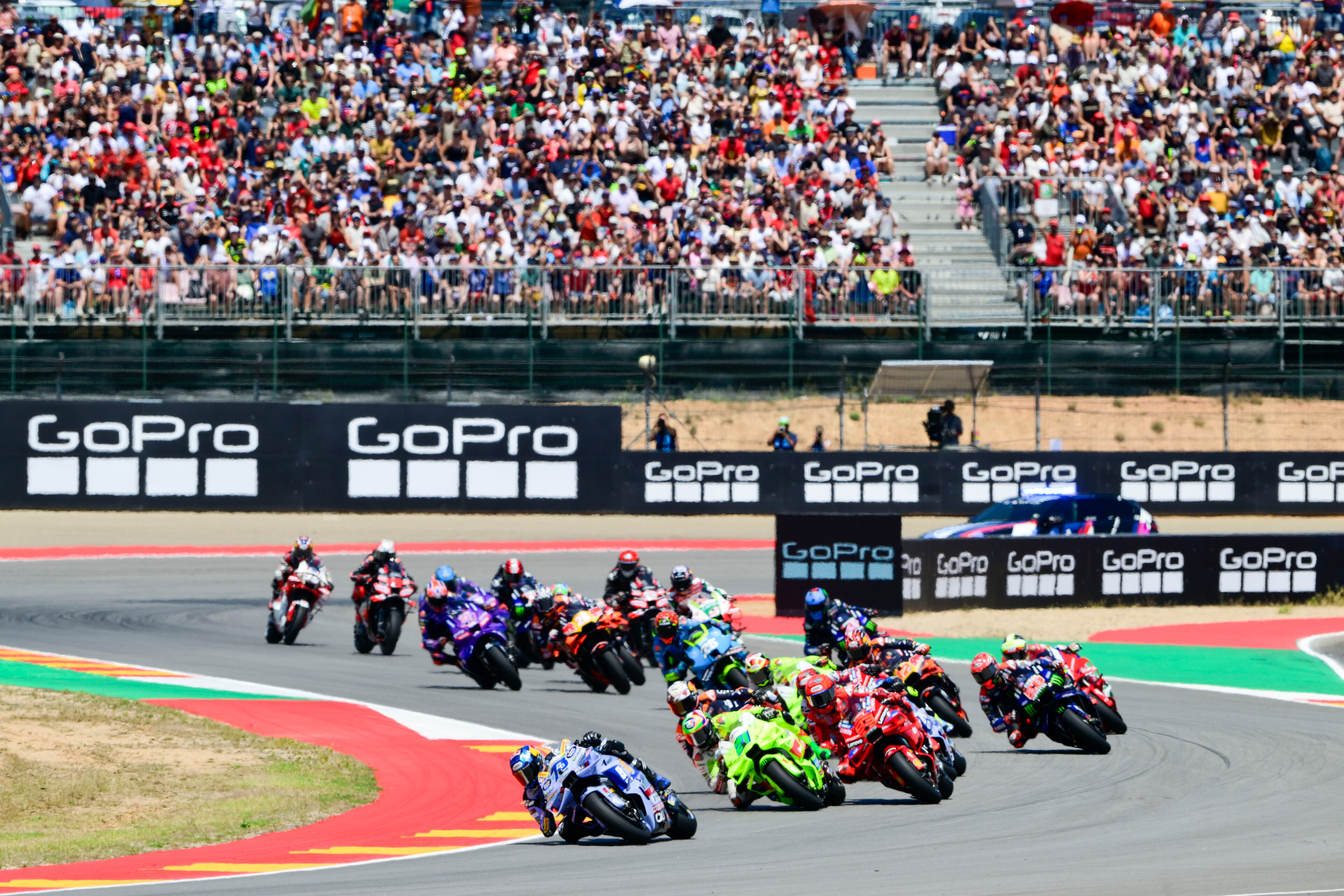 All the MotoGP riders going round the first corner at Aragon