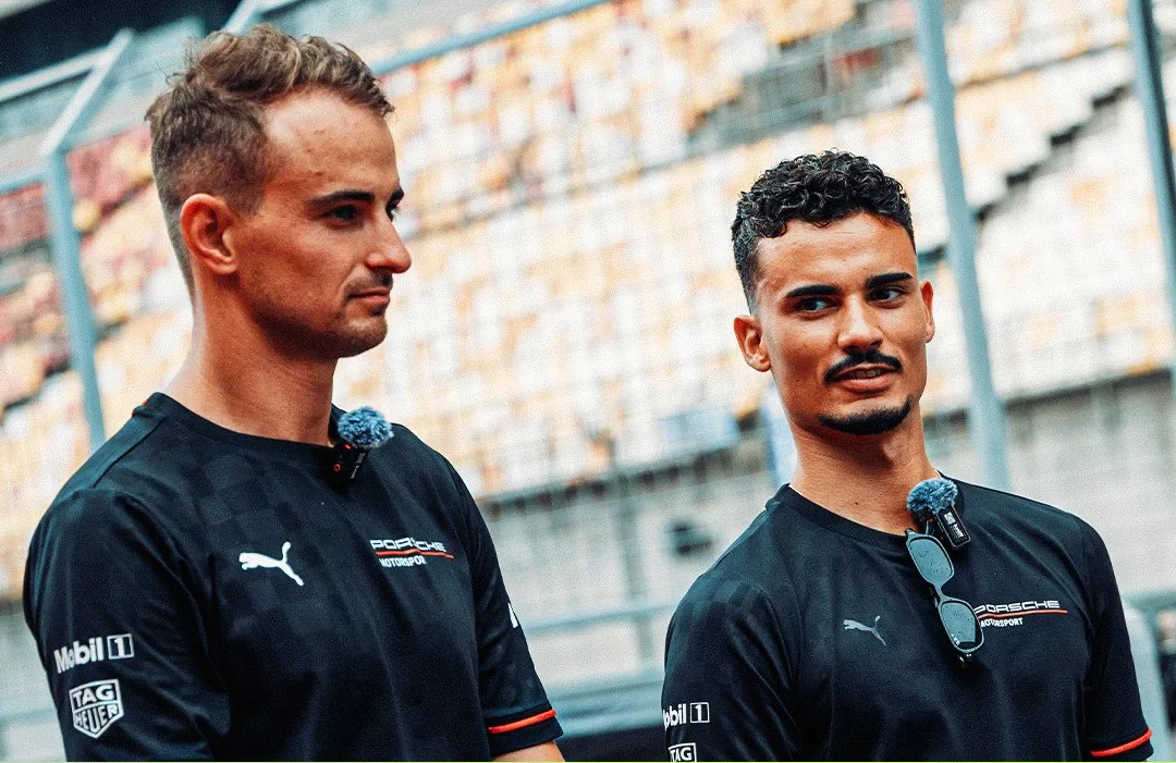 Porsche drivers standing together
